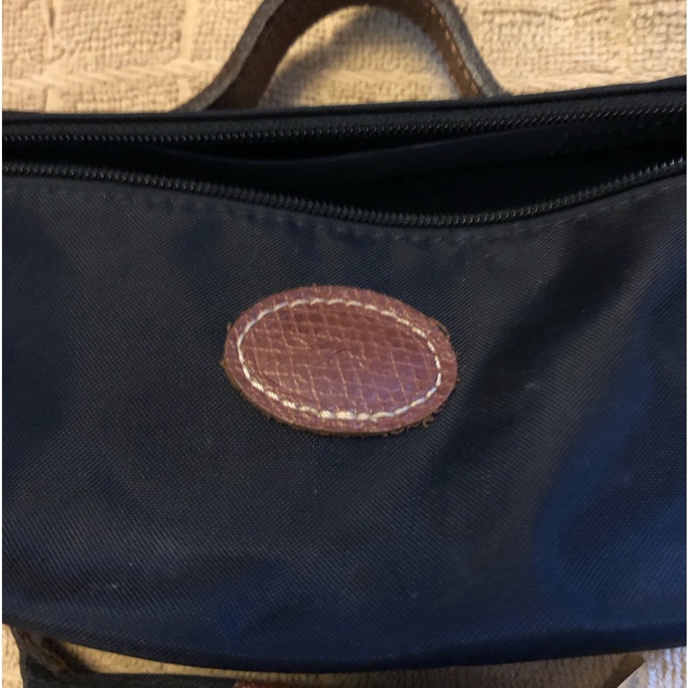 Longchamp canvas make up and change pouch.